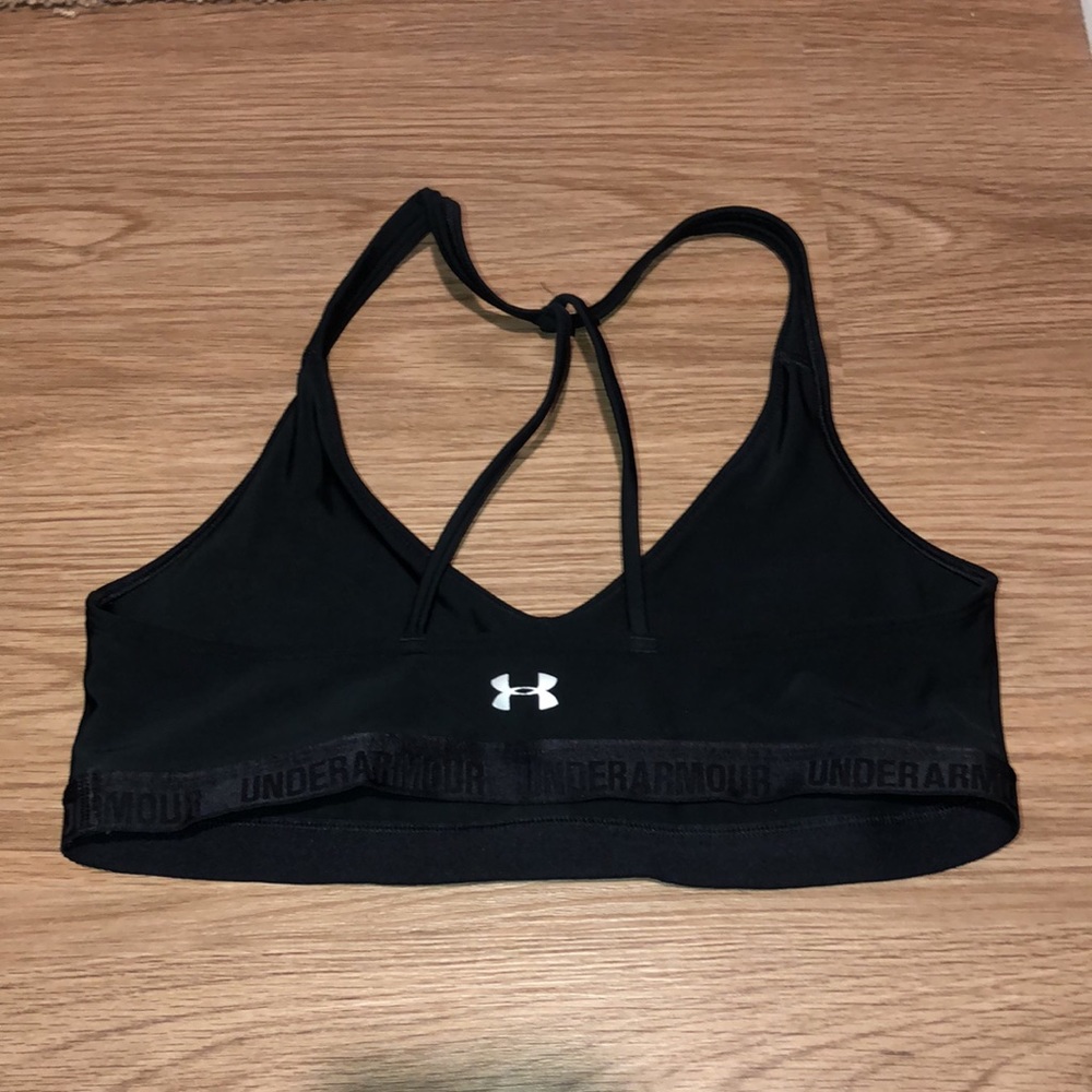 Black underarmour sports bra light support. Great condition.